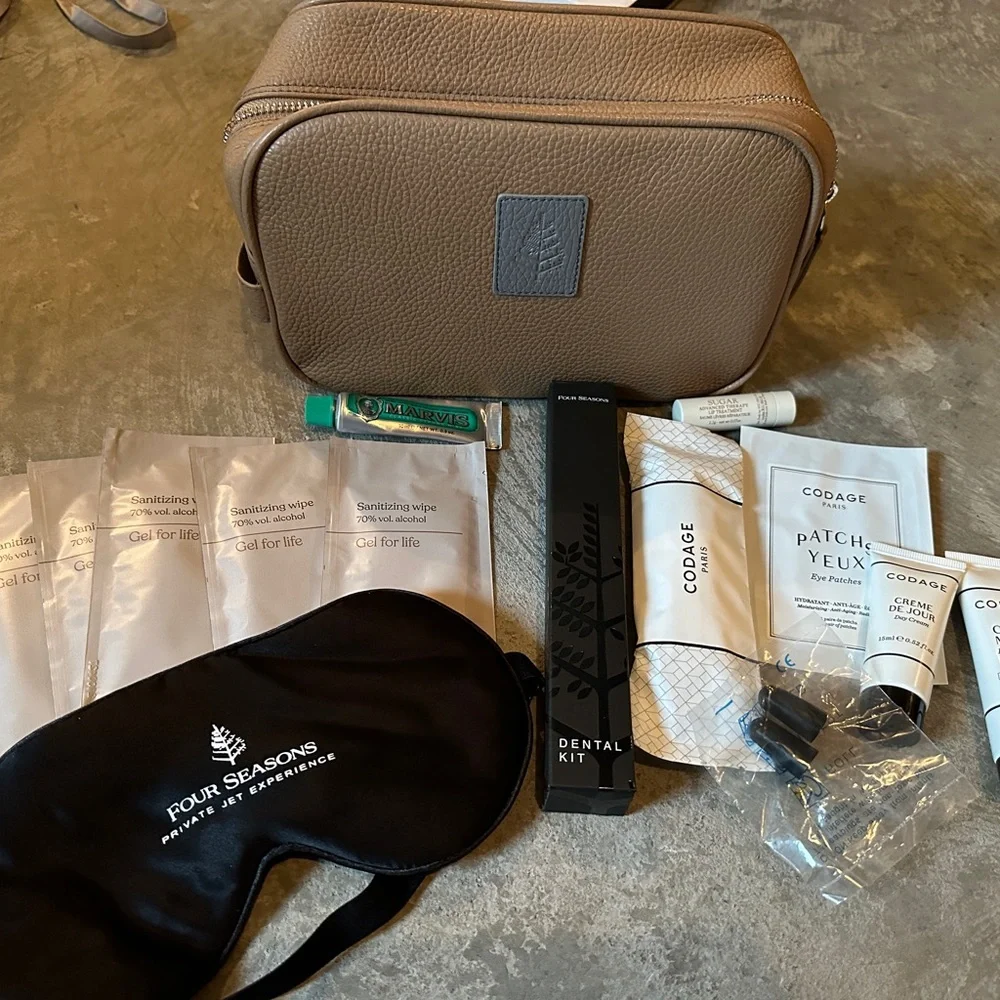 Exclusive Four seasons private jet experience duffel and toiletry kit.  BNWT